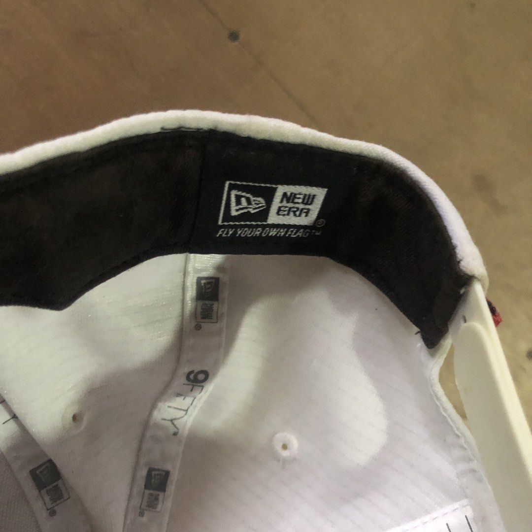 Oakley New Era Snapback Cap White (Category: Caps & Hats) located in Dasmarinas. Submitted by johnlloydm99208 (Listing ID 1452979996, Image 3). Description: - Authentic Oakley cap, perfect for everyday wear. - Features the iconic Oakley logo prominently on the front. - Includes New Era branding on the side and inside for added detail. - Adjustable snapback closure ensures a comfortable, custom fit. - Crafted with a unique textured fabric for a st