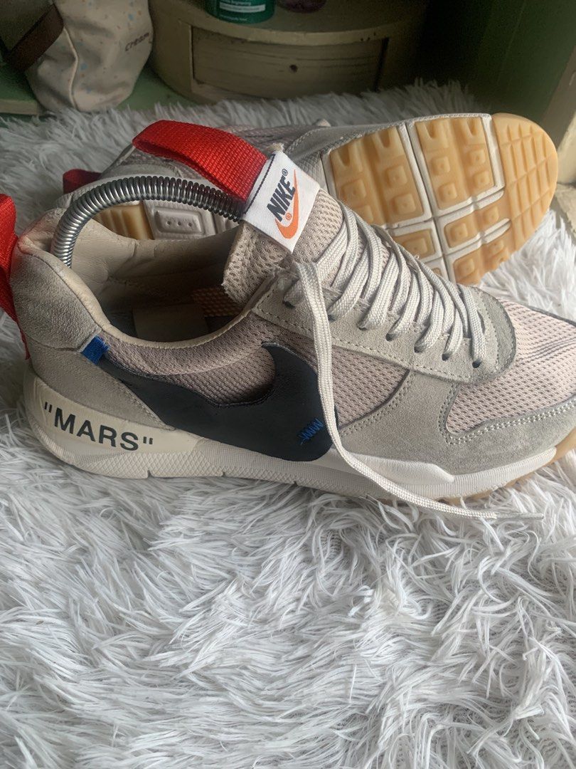 OFF-WHITE x Nike Mars Yard 2.0 Sneakers (Category: Sneakers) located in Manila. Submitted by lei088 (Listing ID 1452908175, Image 3). Description: - Authentic OFF-WHITE x Nike Mars Yard 2.0 - Features iconic "MARS" text detail - Includes original red pull tabs - Unique and eye-catching sole design - A must-have for serious sneaker collectors and enthusiasts - Grab these rare kicks before they're gone!.