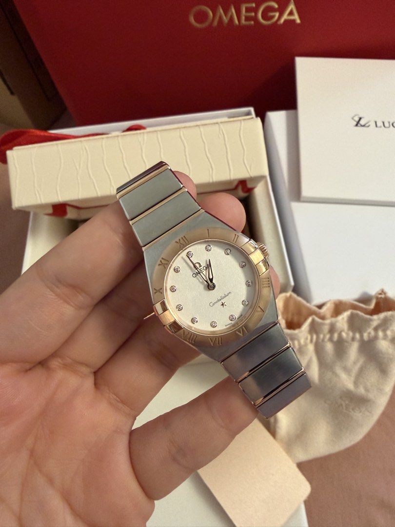 Omega Constellation Diamond Two-Tone Watch (Category: Luxury Watches) located in Rizal. Submitted by kianapreloves (Listing ID 1452924750, Image 3). Description: SRP: 392k Rush selling: 320k Selling my Omega Constellation watch. Features a white dial with diamond hour markers. Two-tone stainless steel and rose gold bracelet. Comes with original box and papers. Great for dressing up or down. Used twice only. Bought May 7,2026 Super bago pa. .
