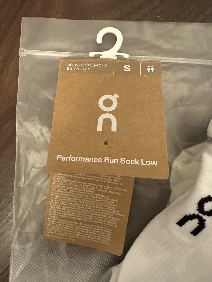 On Running Performance Run Sock Low White (Category: Socks) located in Quezon City. Submitted by bqchane (Listing ID 1453018673, Image 2). Description: - Brand: On Running - Model: Performance Run Sock Low - Color: White with grey trim - Size: S - Condition: Brand new in original packaging - Ideal for: Running, everyday wear.