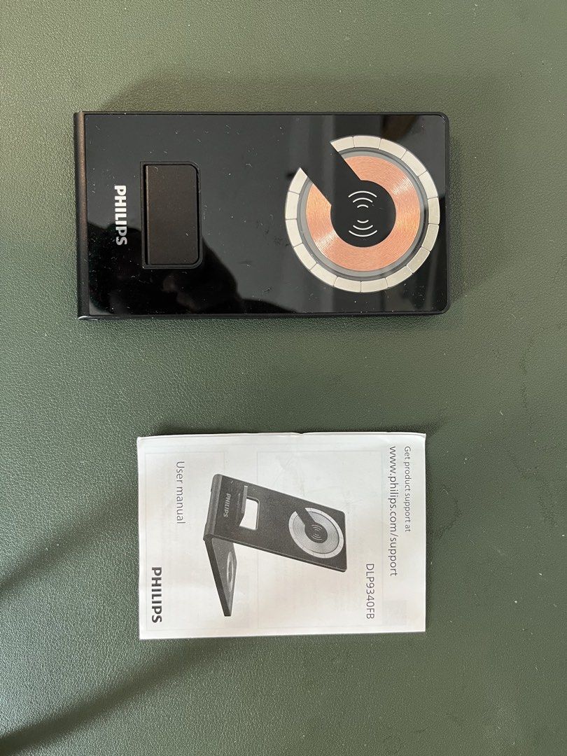 Philips DLP9340FB Wireless Charger & User Manual (Category: Chargers & Cables) located in Mandaluyong City. Submitted by angelasingian7-13486 (Listing ID 1452900640, Image 1). Description: - Sleek black Philips wireless charger magnetic wireless fast charger designed to power your iPhone, Apple Watch, and wireless AirPods simultaneously - used like twice - Features a copper charging coil - User manual and warranty included - rfs I don't use it Me