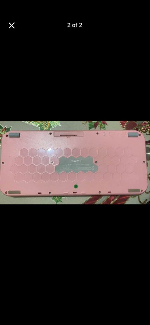Pink Hexagonal Keycap Wireless Keyboard (Category: Computer Keyboard) located in Quezon City. Submitted by ellie.belly025 (Listing ID 1452971005, Image 2). Description: - Cute pink wireless keyboard - Unique hexagonal keycaps - Works great - Wireless connectivity - Easy to use - Battery compartment on the back - Perfect for upgrading your desk setup.