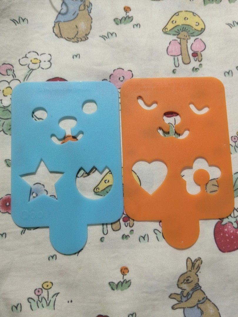 QOO cutter (2pcs) (Category: Bakeware) located in Pagsanjan. Submitted by calmcloud-17d6 (Listing ID 1453021993, Image 1). Description: - Set of 2 cute bear face cookie cutters. - Blue cutter features a star and jagged edge. - Orange cutter has a heart and flower design. - Perfect for baking fun shapes. - Easy for both kids and adults to use. - Adds enjoyment to your baking sessions..