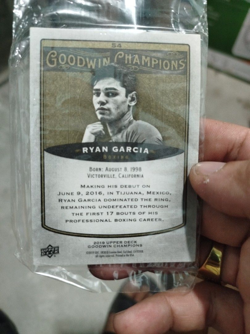 Ryan Garcia Boxing Card - 2019 Upper Deck Goodwin Champions (Category: Raw Singles) located in Subic. Submitted by regiedaniel01 (Listing ID 1453008901, Image 2). Description: - 2019 Upper Deck Goodwin Champions card - Features boxer Ryan Garcia - Includes his birthdate and professional debut details - Ideal for boxing fans and collectors - A great piece of boxing memorabilia.