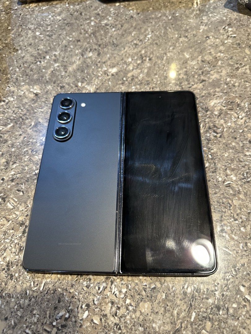 Samsung Galaxy Fold 5 (Category: Samsung) located in Las Pinas. Submitted by cyphersellsph (Listing ID 1453030579, Image 2). Description: Used as second phone, mainly media consumption. - With scratches on hinge (see photo) - Software no issues - Smart locked - Negotiable.