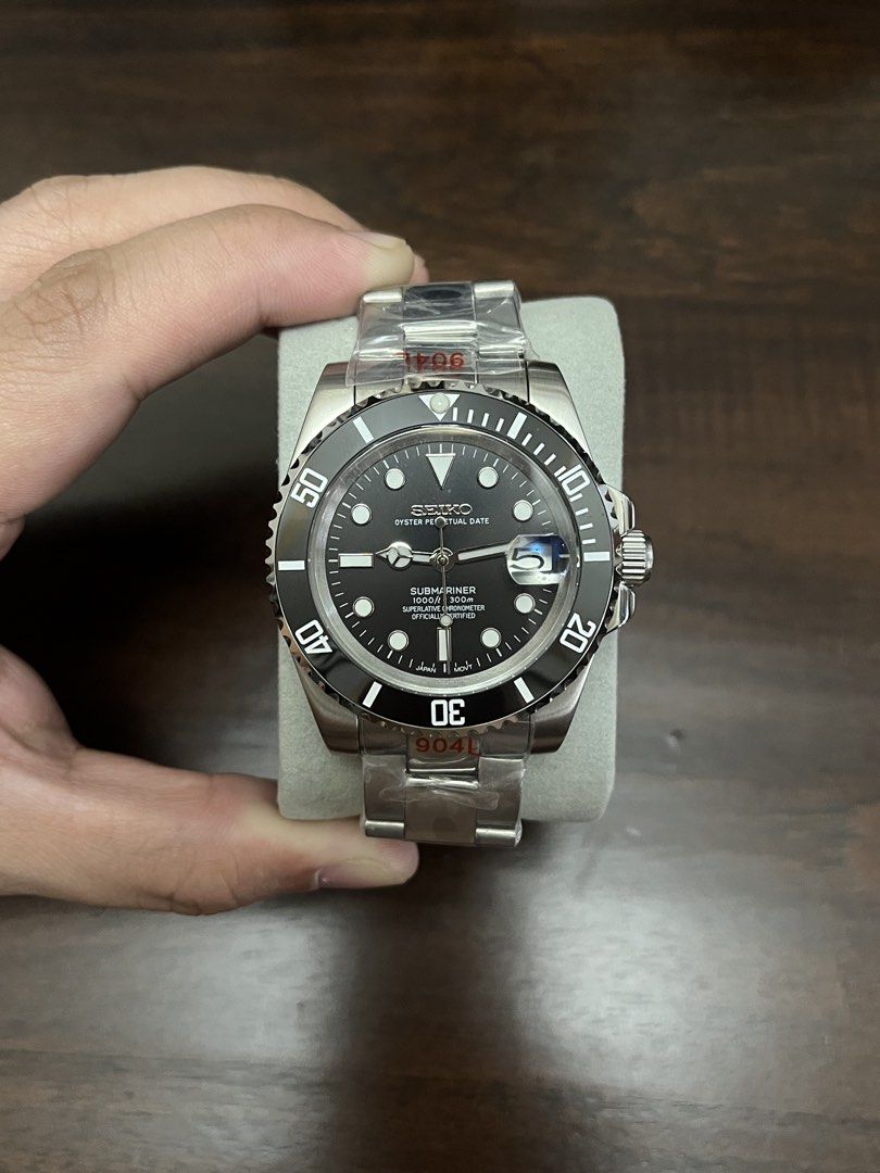 Seiko Mod Submariner (Category: Luxury Watches) located in Quezon City. Submitted by itsjared (Listing ID 1453048620, Image 1). Description: Seiko Mod Black Submariner Brand new Actual photos posted * 904L Stainless Steel * Original Seiko NH35 Movement * Submariner Dial * Oyster Bracelet * 40mm Case Diameter * Open Back * Sapphire Crystal Glass * 20mm Lug Width * Comes with Box, Watch Pillow & Paper Bag Meetups at: Weekdays - Dasma | Imus & Nuval