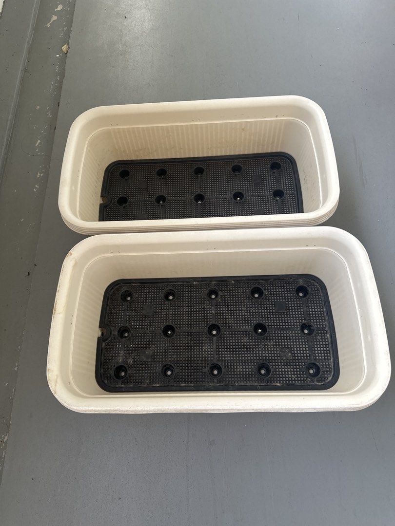 Set of 2 White Rectangular Planter Boxes with Inserts (Category: Pots & Planters) located in Singapore. Submitted by pg-21 (Listing ID 1452975813, Image 2). Description: - Set of 2 white rectangular planter boxes - Includes black inner pots with drainage holes .