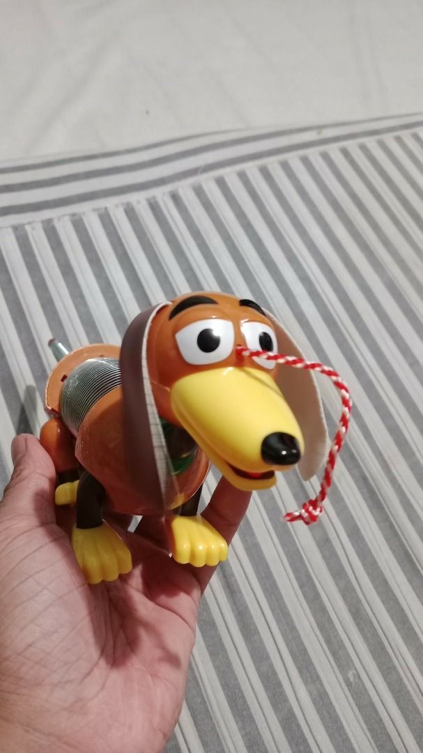 Slinky Dog Junior Pull Toy from Toy Story (Category: Kids Toys) located in Manila. Submitted by secrettoys (Listing ID 1452974136, Image 2). Description: - Classic Slinky Dog Junior pull toy - Inspired by Disney's Toy Story - Interactive toy with a springy body for fun movement - Comes in original packaging - Great addition to any toy collection.