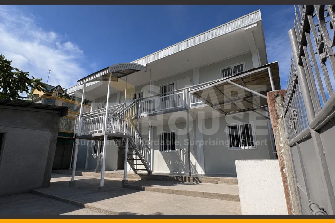 SMARTHOUSE PREFAB CONTAINER APARTMENT PROJECT (Category: Construction & Building Materials) located in Quezon City. Submitted by Smarthouseph (Listing ID 1452920903, Image 1). Description: Habang ang iba nagbabayad pa sa construction... ikaw, pwede nang naniningil ng renta. 💰 That's the power of building smarter. With Smarthouse Prefab Container Apartments, you can accelerate your project without sacrificing quality. ✔ Modern Units ✔ Durable Str