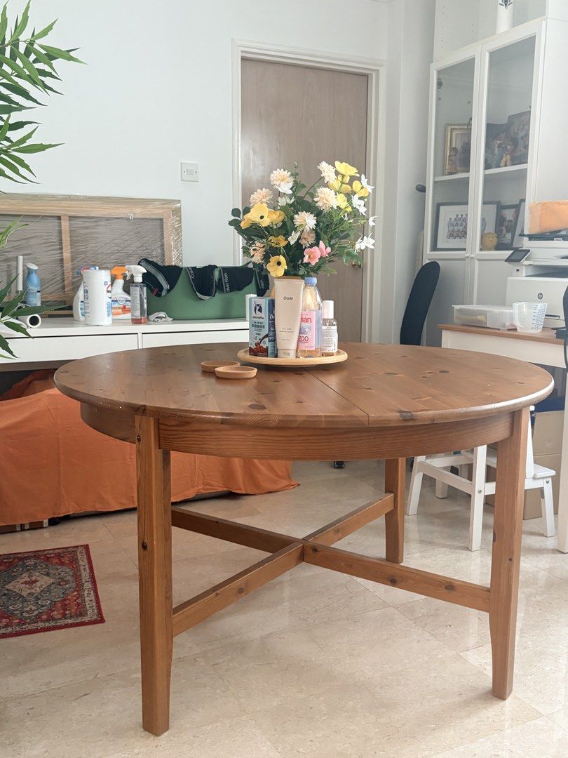 Solid wood, extendable dining table (Category: Tables & Sets) located in Singapore. Submitted by happybird.gmssan (Listing ID 1452906327, Image 3). Description: Good solid wood dining table, with two minor(ish) scratches. Unextenfed version (pictured) can accommodate four dining chairs, extended version can accommodate six. Giving away as no space in new flat 😅.
