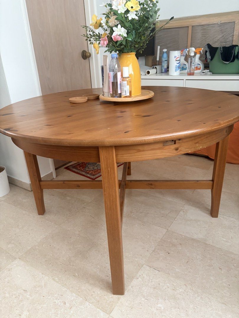 Solid wood, extendable dining table (Category: Tables & Sets) located in Singapore. Submitted by happybird.gmssan (Listing ID 1452906327, Image 2). Description: Good solid wood dining table, with two minor(ish) scratches. Unextenfed version (pictured) can accommodate four dining chairs, extended version can accommodate six. Giving away as no space in new flat 😅.