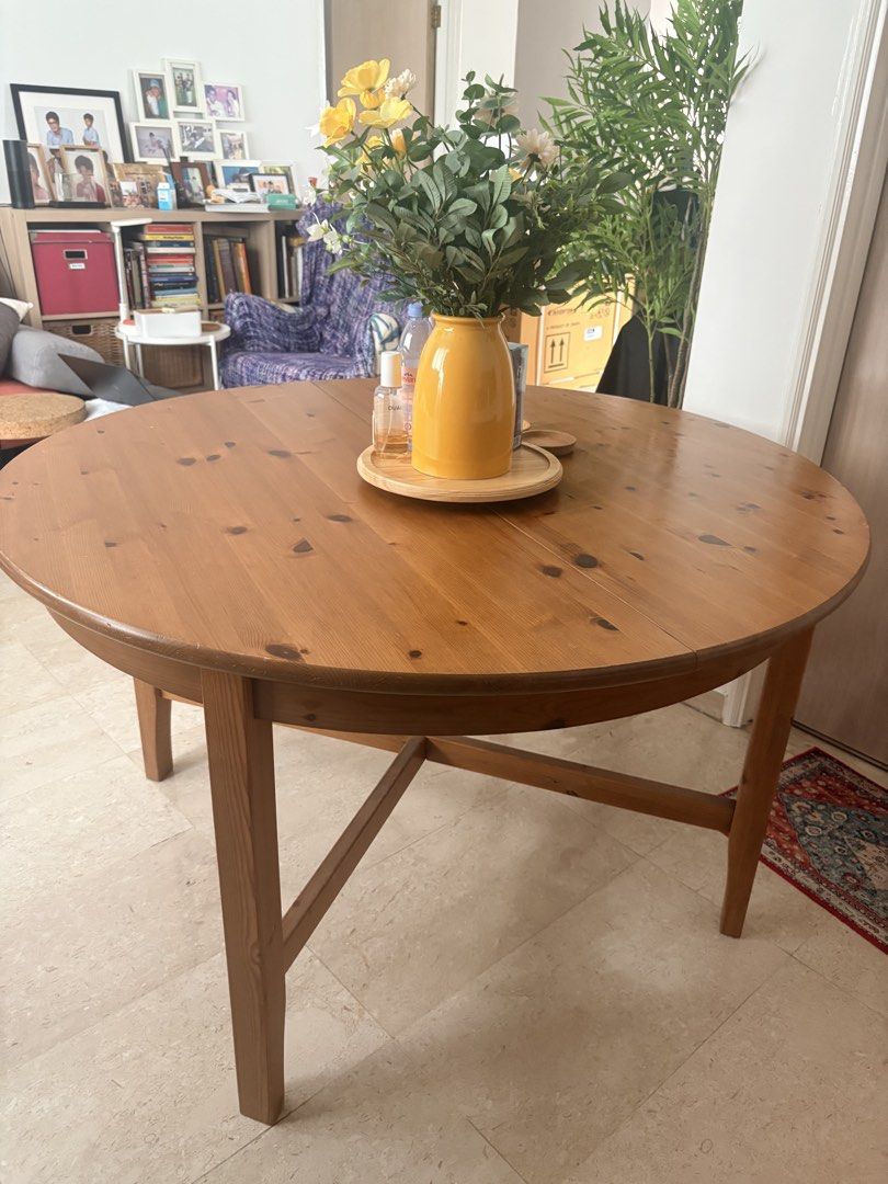 Solid wood, extendable dining table (Category: Tables & Sets) located in Singapore. Submitted by happybird.gmssan (Listing ID 1452906327, Image 1). Description: Good solid wood dining table, with two minor(ish) scratches. Unextenfed version (pictured) can accommodate four dining chairs, extended version can accommodate six. Giving away as no space in new flat 😅.