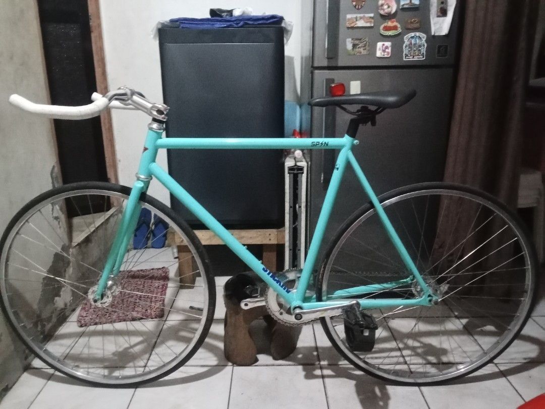 Spin Fixed Gear Medium - Teal (Category: Bicycles) located in Taguig. Submitted by nostalgia1_l (Listing ID 1452885471, Image 1). Description: Frame:+SPIN+4130+Sze+M Drivetrain:+ SHIMANO+BB+Un+300 Skeace+Quicktime+Crankset XJ+HUBS+36H+ Weinmann+Rims COMPASS Tires Cockpit: VP+Headseat+34MM Wake+Stem+100,+±10° MOB+Semi+pursuit+Bullhorn Seatpost & Saddle Nobrand 48/19 ABSOLUTELY NO ISSUES.