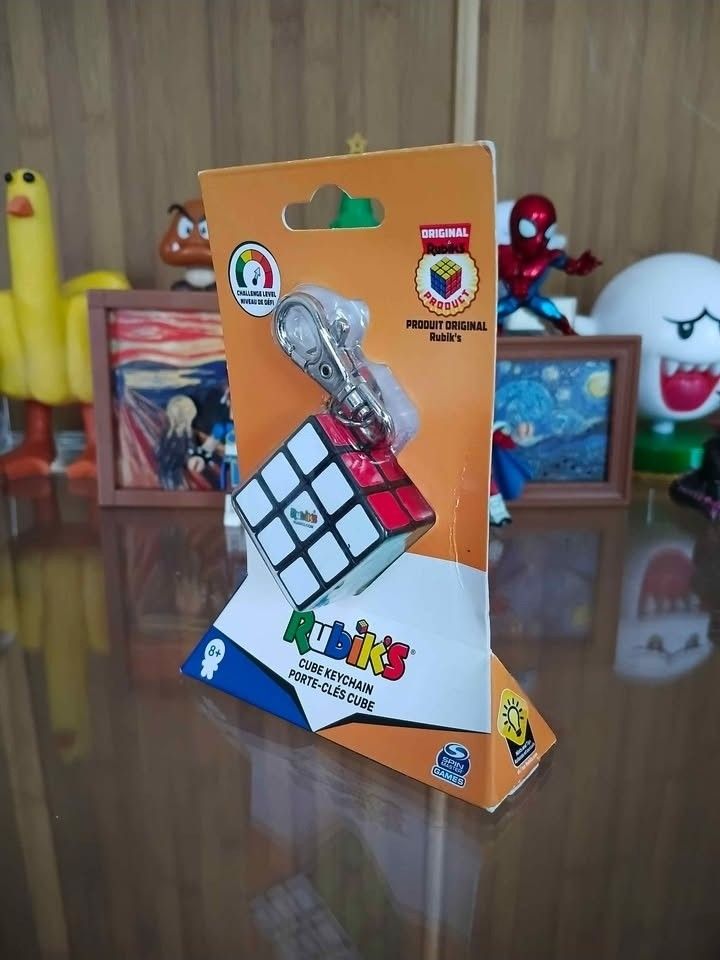 SPIN MASTER - Rubik's Cube 3x3 Keychain (Category: Board Games & Puzzles) located in San Miguel. Submitted by ultimateconyo (Listing ID 1452924556, Image 1). Description: SPIN MASTER - Rubik's Cube 3x3 Keychain MOC / SEALED - 1000.00.