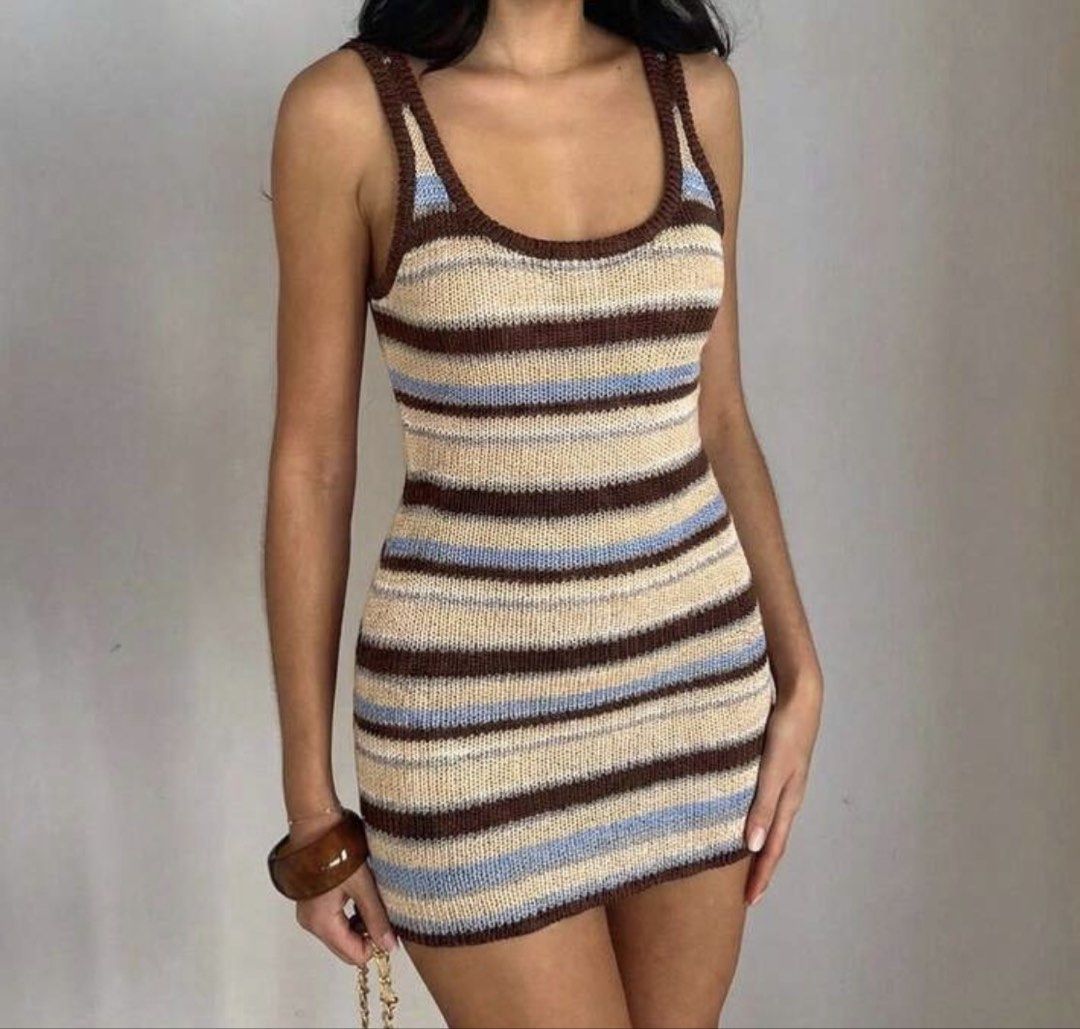 Striped Crochet Knit Mini Dress (Category: Dresses) located in Manila. Submitted by shaeshops (Listing ID 1452937185, Image 2). Description: - Cute striped knit mini dress - Very stretchable - Features a scoop neck and tank straps - Textured knit fabric - Color: Brown, beige, and light blue stripes.