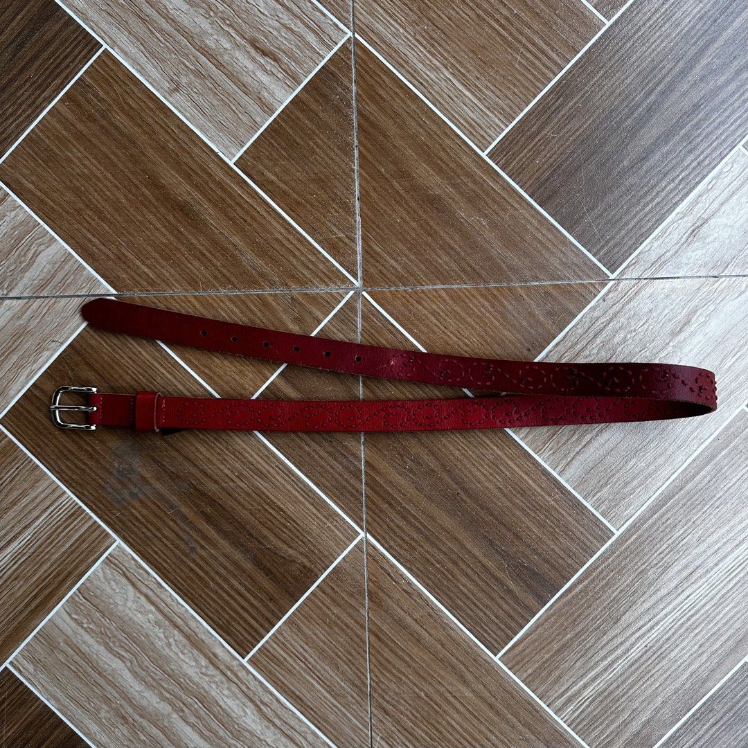 Stussy Red Leather Belt S/M (Category: Belts) located in Davao. Submitted by kurttyyo (Listing ID 1452887146, Image 2). Description: - Brand: Stussy - Color: Red - Material: Leather - Size: S/M - Features: Perforated pattern, silver buckle closure.