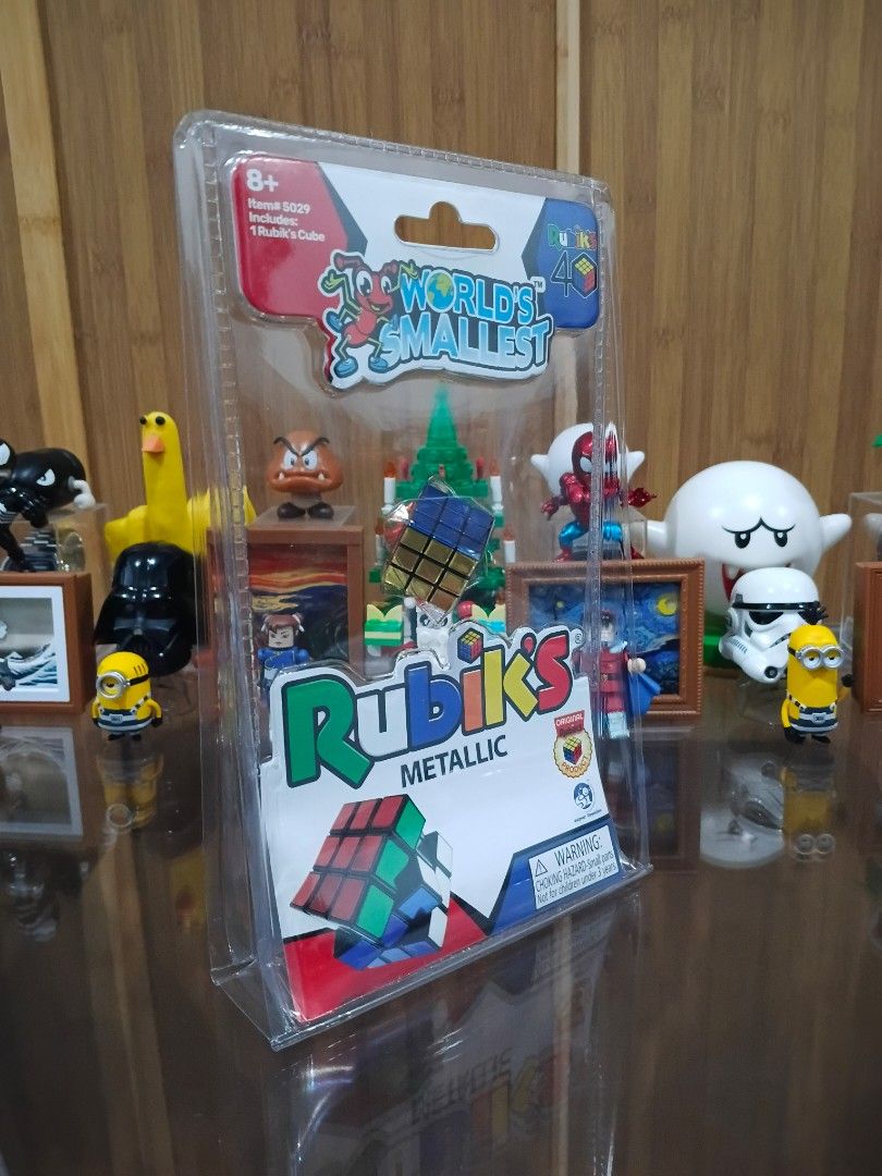 SUPER IMPULSE - World's Smallest Rubik's Cube (Metallic Edition) (Category: Board Games & Puzzles) located in San Miguel. Submitted by ultimateconyo (Listing ID 1452972915, Image 2). Description: SUPER IMPULSE - World's Smallest Rubik's Cube (Metallic Edition) MOC / SEALED - 700.00.