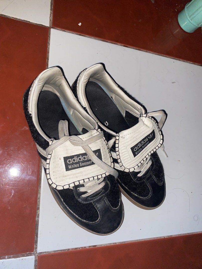 TAKE BOTH 1500!!! (Category: Sneakers) located in Baguio. Submitted by aglosolos305556 (Listing ID 1453006806, Image 1). Description: - Black Adidas Wales Bonner sneakers with white accents - Red Vans slip-on shoes - Both pairs are pre-loved and ready for a new home - Please check photos for detailed condition adidas is ua vans is original.
