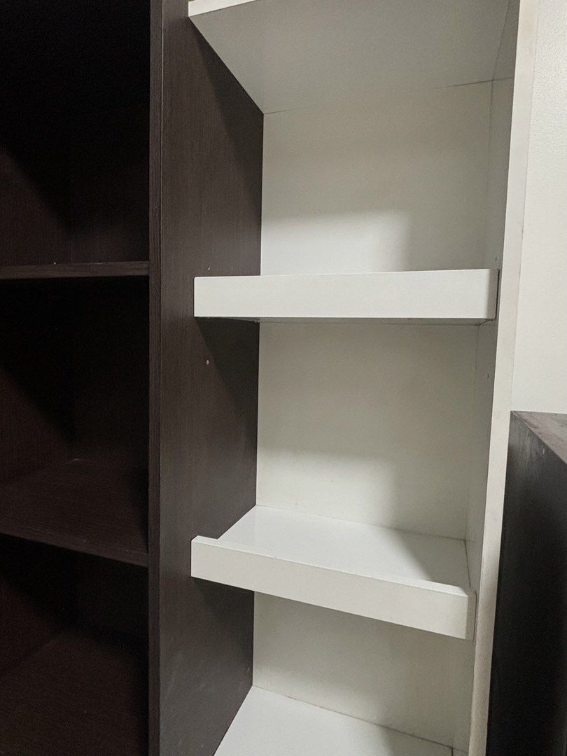 Tall Storage Cabinet with Mirror and Shelves (Category: Shelves, Cabinets & Racks) located in Manila. Submitted by thingsforsale07 (Listing ID 1453039812, Image 3). Description: - Tall storage cabinet with a sleek dark brown frame. - Features a full-length mirror on one side. - Opposite side has convenient white open shelves. - Mirror door opens to reveal additional hidden shelving. - Ideal for organizing clothes, shoes, accessories, or displayin