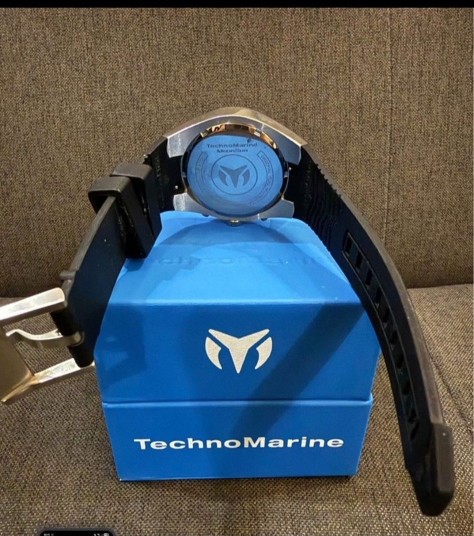 TechnoMarine MoonSun Chronograph Watch (Category: Men's Watches) located in Makati City. Submitted by lokaltisoy.1274 (Listing ID 1453003443, Image 2). Description: - Authentic TechnoMarine watch - Black dial with silver accents - Chronograph function - Comes with original box - Rubber strap with buckle closure - Versatile for everyday or special occasions.