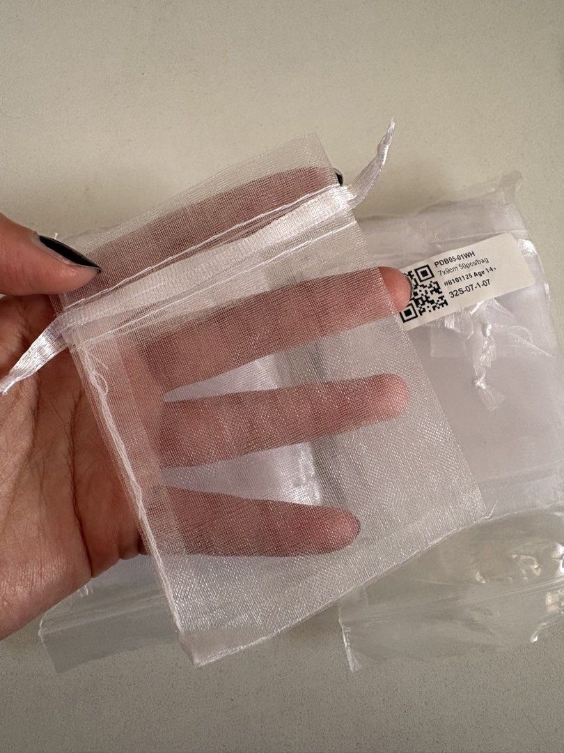Tiny drawstring packaging 7x9cm (Category: Craft Supplies & Tools) located in Singapore. Submitted by eejlnry (Listing ID 1452904421, Image 3). Description: clearing stuff from my flower business size: 7x9cm quantity: i think i have at least 60 here material: Sheer organza perfect for jewelry, small gifts, party favors, and crafts.