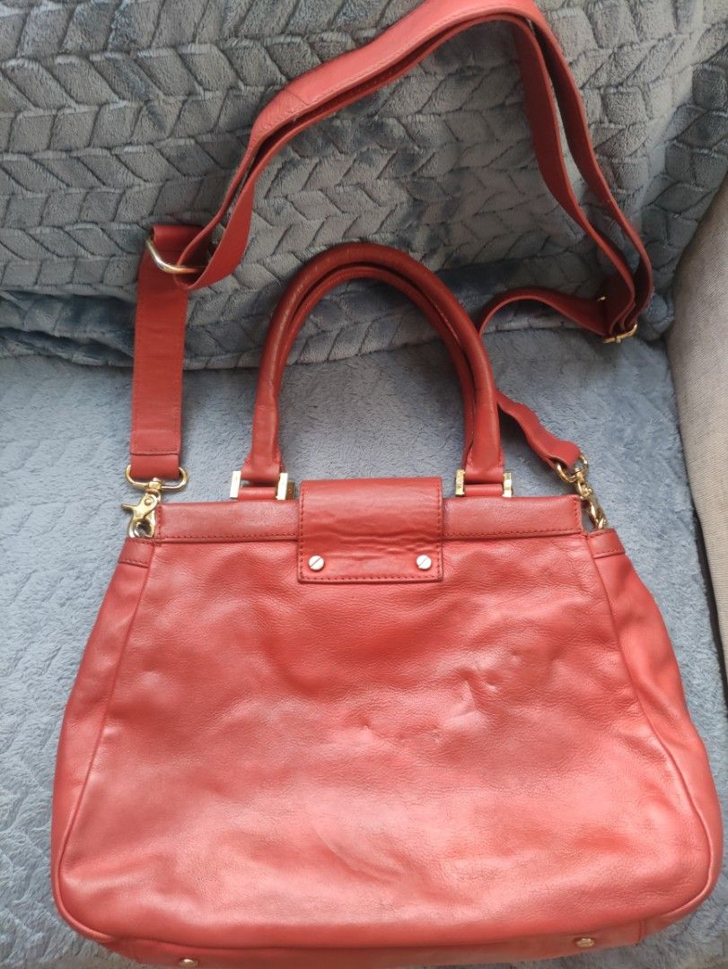 Tory Burch Red Leather Tote Bag with Gold Hardware (Category: Luxury Bags & Wallets) located in Cainta. Submitted by luxesparkle (Listing ID 1453005351, Image 2). Description: Tory Burch Bag U.S bought very nice in actual .