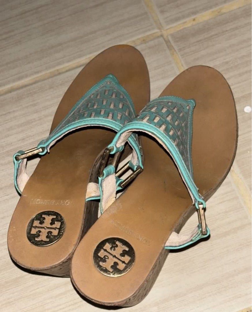 Tory Burch Wedge Sandals Turquoise and Tan (Category: Wedges) located in Manila. Submitted by thingsforsale07 (Listing ID 1452958954, Image 3). Description: - Tory Burch wedge sandals - Turquoise and tan woven strap design - Gold buckle detail - Comfortable cork wedge heel - Ideal for summer wear - Minor signs of wear on soles and insoles.