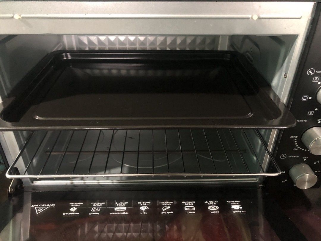Tough Mama Oven Toaster (Category: Ovens & Toasters) located in Manila. Submitted by joe0777 (Listing ID 1452916053, Image 2). Description: - Tough Mama Oven Toaster - Versatile cooking functions: barbecue, bread, hamburger, fish, hotdog, cake, pizza, chicken - Easy-to-use temperature and timer controls - Includes baking tray and wire rack - Ideal for small kitchen spaces.