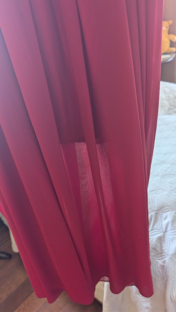 Unbranded Maroon Chiffon Maxi Skirt (Category: Skirts) located in Las Pinas. Submitted by decluttering.taurus (Listing ID 1452925666, Image 2). Description: LAST PRICE POSTED! Flowy maroon maxi skirt with an elastic waistband and inner lining. Elegant, comfortable, and easy to dress up or down. Size: Free size; waist approximately 12–13 inches laid flat, stretchable Length: Approximately 33–34 inches RFS: Not my style anymore Payment: BPI / GCash