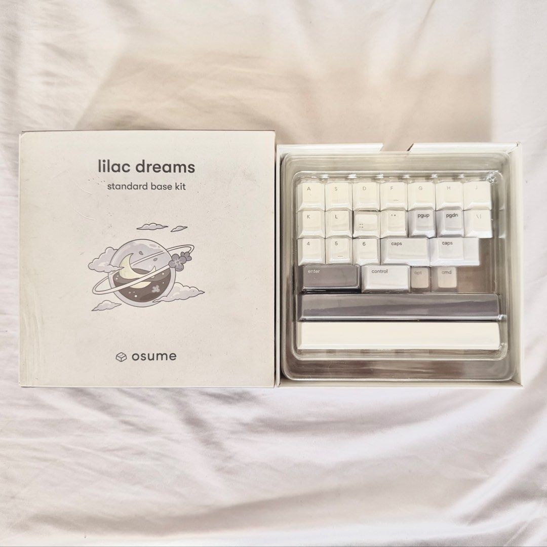 (USED) Osume Lilac Dreams Base Keycaps (Category: Computer Keyboard) located in Manila. Submitted by camspgdt20 (Listing ID 1452883934, Image 1). Description: ✅ Purchase directly from Osume Website ✅ Good as new ✅ Sell for half price of total cost ‼️ Box damage due to shipping problem but doesn't affect the keycaps Loc: Navotas.