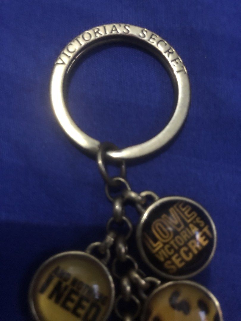 Victoria's Secret BAG CHARMS (Category: Other Accessories) located in Quezon City. Submitted by unique2shop (Listing ID 1452954463, Image 2). Description: - Authentic Victoria's Secret keychain - Features multiple charms with iconic VS sayings: 'Love Victoria's Secret', 'And Nothing I Need', 'Everything I Want', 'Angel', 'Sexy Little Thing' - Includes stylish leopard print and tiger stripe charms with silhouette - Versatile accessory for your key