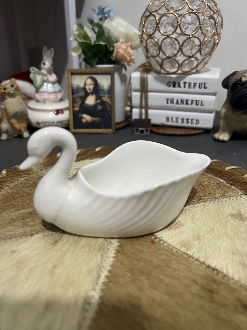 White Ceramic Swan Serving Dish (Category: Dinnerware & Cutlery) located in Las Pinas. Submitted by maple0305 (Listing ID 1452982975, Image 2). Description: - Adorable white ceramic swan dish - Ideal for serving sauces or small snacks - Adds a charming touch to any table setting - Approximate dimensions: [insert length] by [insert width].