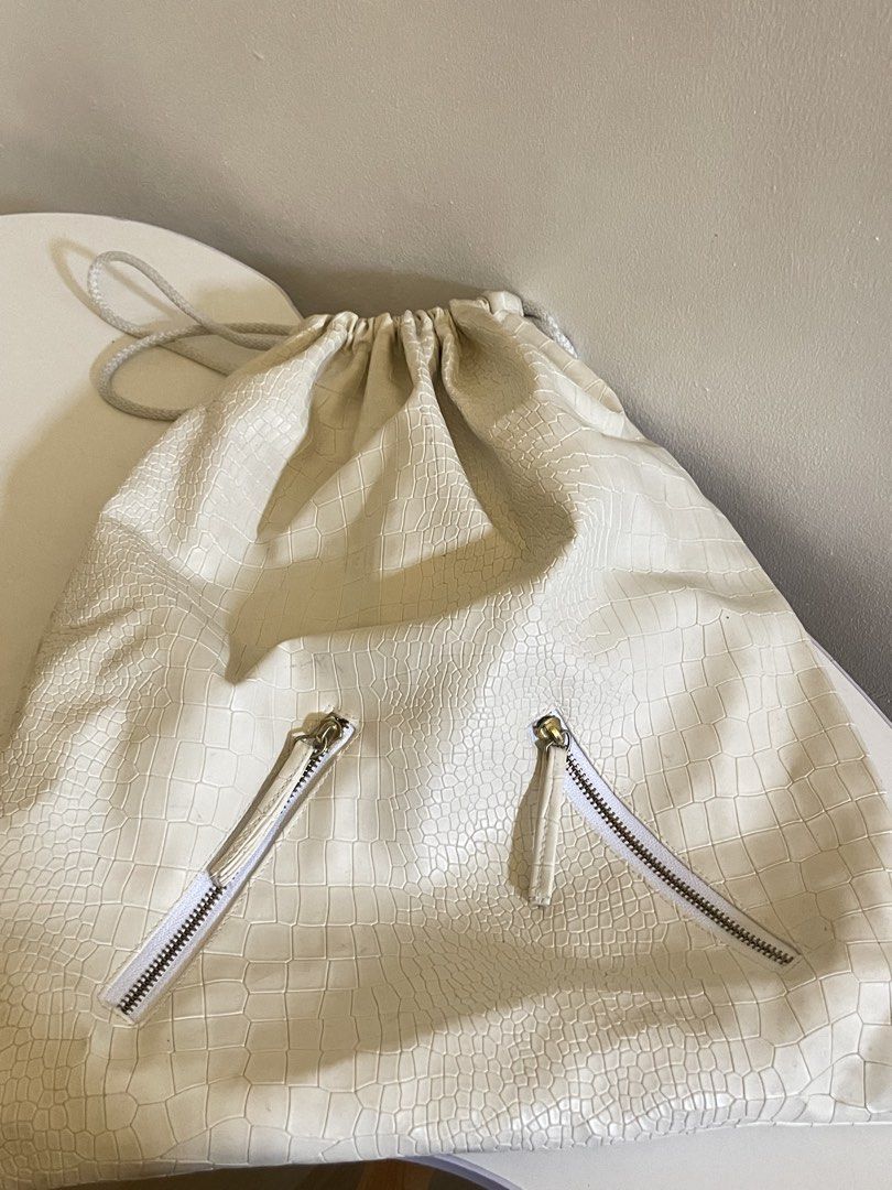 White Crocodile drawstring bag (Category: Backpacks) located in Taguig. Submitted by declutterwithtally (Listing ID 1452930190, Image 1). Description: .