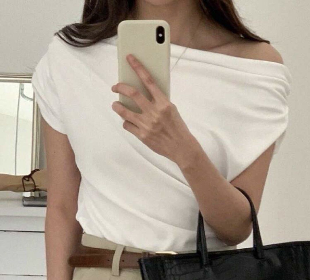 White Off-Shoulder Drape Top (Category: Blouses) located in Manila. Submitted by chiiisells_ (Listing ID 1453041247, Image 3). Description: - Chic off-shoulder white top - Short sleeves - Flowy fabric for a graceful look - Versatile: dress up or down - Easily pairs with pants or skirts - A wardrobe essential!.