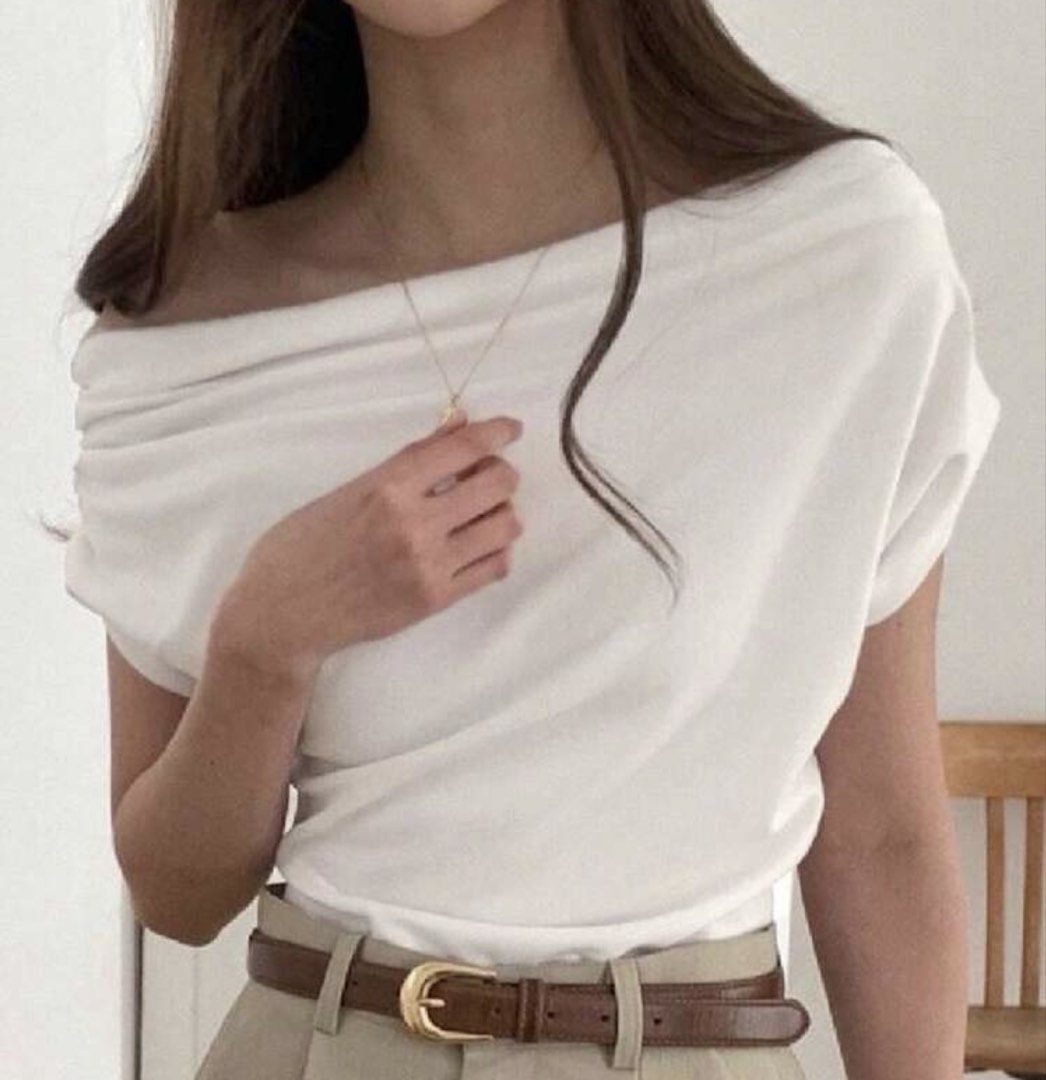 White Off-Shoulder Drape Top (Category: Blouses) located in Manila. Submitted by chiiisells_ (Listing ID 1453041247, Image 2). Description: - Chic off-shoulder white top - Short sleeves - Flowy fabric for a graceful look - Versatile: dress up or down - Easily pairs with pants or skirts - A wardrobe essential!.