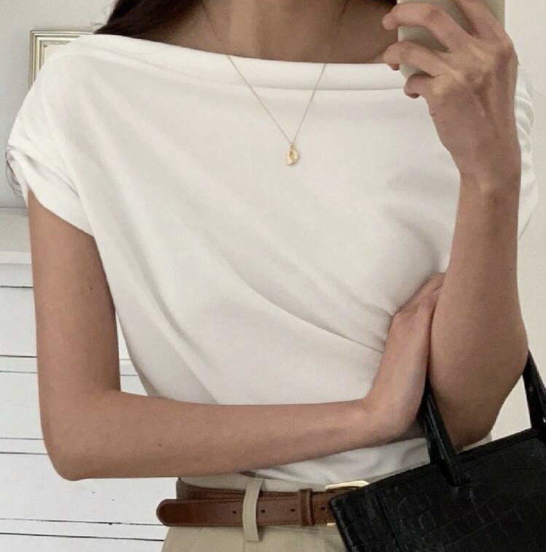 White Off-Shoulder Drape Top (Category: Blouses) located in Manila. Submitted by chiiisells_ (Listing ID 1453041247, Image 1). Description: - Chic off-shoulder white top - Short sleeves - Flowy fabric for a graceful look - Versatile: dress up or down - Easily pairs with pants or skirts - A wardrobe essential!.