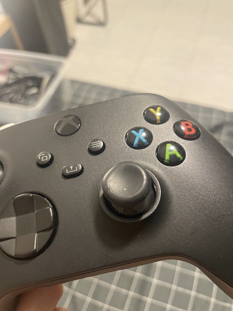 Wireless Xbox controller (Category: Controllers) located in Singapore. Submitted by kur0cat (Listing ID 1452899262, Image 2). Description: Compatible with Xbox Series S/X, Xbox One X, Xbox One S, Xbox One, Windows 10 White: SOLD Black: Used often, $40 Please scroll for thumbstick condition on the black controller .