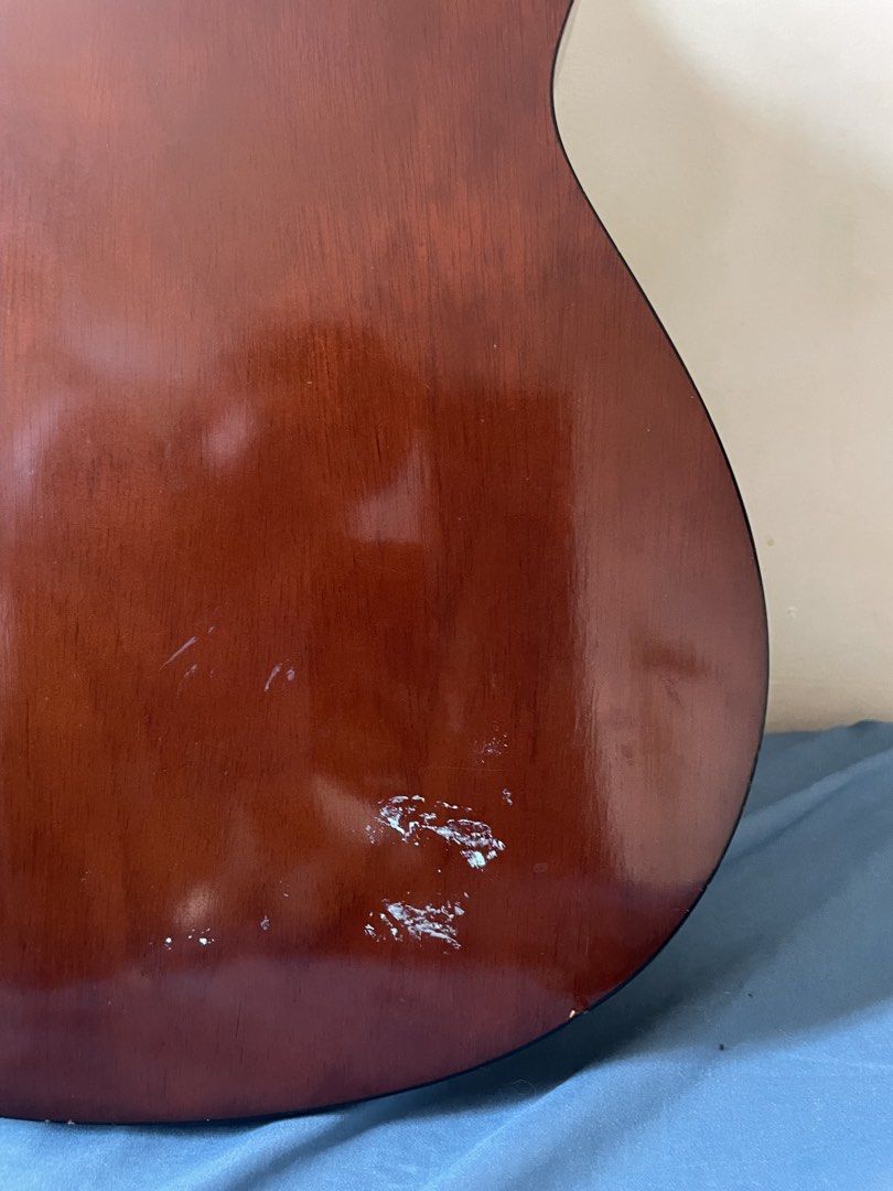 Yamaha C40 Classic Guitar (Negotiable) (Category: Musical Instruments) located in Bulacan. Submitted by thenasofia_ (Listing ID 1452922348, Image 3). Description: Selling our original Yamaha C40 classical guitar. The guitar is in good playing condition with no functional issues. It has normal cosmetic signs of use such as minor scratches and paint chips from age, but there are no cracks or structural damage. The original gig bag is included for f