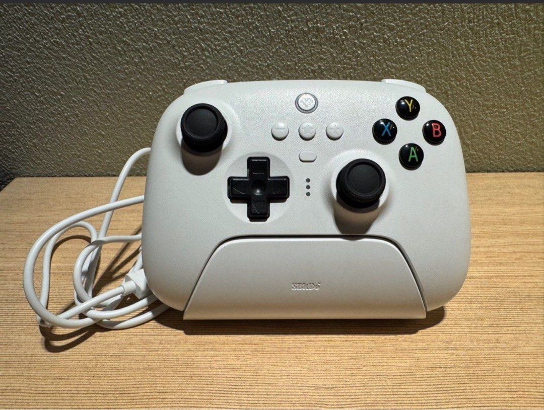 8BitDo Ultimate Wireless 2.4G White (Category: Controllers) located in Manila. Submitted by kuroshirooreo (Listing ID 1447549189, Image 1). Description: Windows/Android/Raspberry Pi: 81HA01. Used only twice. There is a slight dent above the (B) Button as seen on the photos. Works like new. Compatibility: PlayStation, Nintendo, Others - White Xbox Wireless Controller - Includes Charging Dock - Includes USB Cable - Excellent Working Condition.