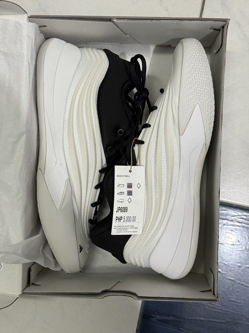 Adidas Dame X (Category: Sneakers) located in Makati City. Submitted by mav1001 (Listing ID 1447602715, Image 1). Description: - Brand new Adidas basketball shoes - Classic white and black colorway - Model number: JP6089 - Includes original box and tags - Ideal for playing basketball.