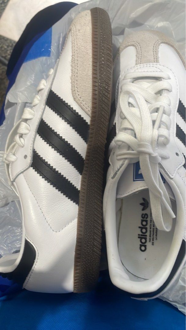 Adidas Samba OG White Black Gum Sole (Category: Sneakers) located in Mandaluyong City. Submitted by lifelistener (Listing ID 1447472433, Image 1). Description: - Classic Adidas Samba OG sneakers - Color: White leather with black stripes - Sole: Gum sole - Size: 6 UK / 4.5 US Women's - Style: Iconic and perfect for everyday wear.