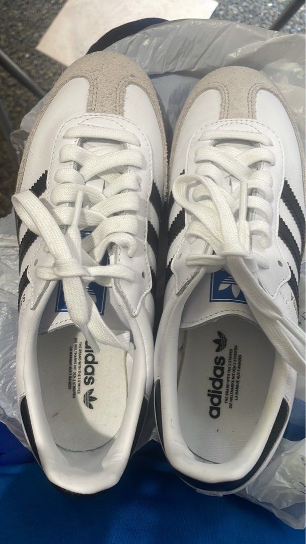 Adidas Samba OG White Black Gum Sole (Category: Sneakers) located in Mandaluyong City. Submitted by lifelistener (Listing ID 1447472433, Image 2). Description: - Classic Adidas Samba OG sneakers - Color: White leather with black stripes - Sole: Gum sole - Size: 6 UK / 4.5 US Women's - Style: Iconic and perfect for everyday wear.