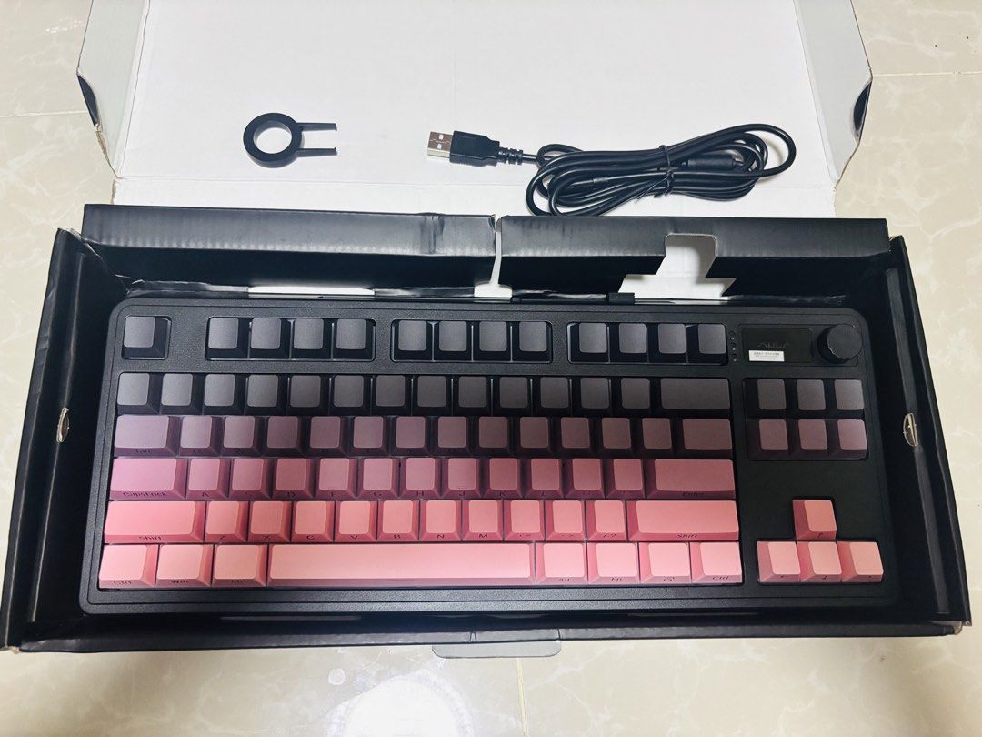 AULA S3187 Silicone Keyboard (Category: Computer Keyboard) located in Quezon City. Submitted by lottiebunny (Listing ID 1447478496, Image 2). Description: FIX PRICE -AULA S3187 Silicone Keyboard -Tri-mode - Chic Pink & Grey Gradient Keycaps - Includes USB Cable & Keycap Puller - Convenient Multifunctional Knob - Fashionable Exterior Design - Compatible with Multiple Systems.