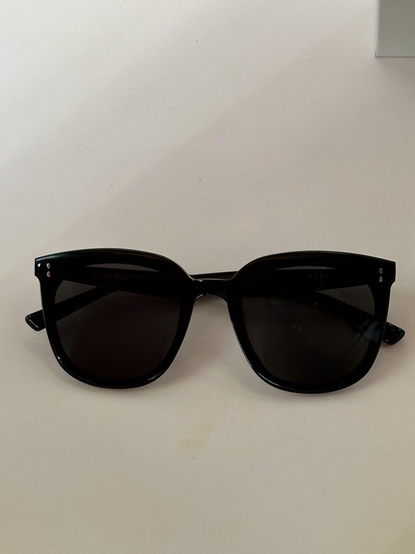 AUTHENTIC Gentle Monster Rosy 01 Black Sunglasses (Category: Sunglasses & Eyewear) located in Lapu Lapu. Submitted by pangayamph (Listing ID 1447482400, Image 3). Description: AUTHENTIC Gentle Monster Rosy 01 sunglasses. regular size. Brand New, never worn. Comes with the original box, case, cloth, plastic and shopping bag. rfs: my husband and I received the matching Rosy shades as a gift from our Korean friend that we were hosting. It’s not his 