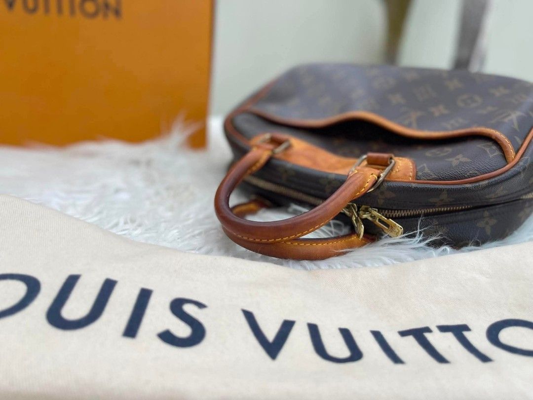 Authentic Louis Vuitton Deauville PM Monogram (Category: Luxury Bags & Wallets) located in Davao. Submitted by allaboutscarvesandties (Listing ID 1447637819, Image 2). Description: - Classic Louis Vuitton Speedy bag in iconic monogram canvas. - Features durable leather trim and handles with a beautiful patina. - Secure zipper closure for your belongings. - Interior includes multiple pockets for easy organization. - Comes with original dust bag an