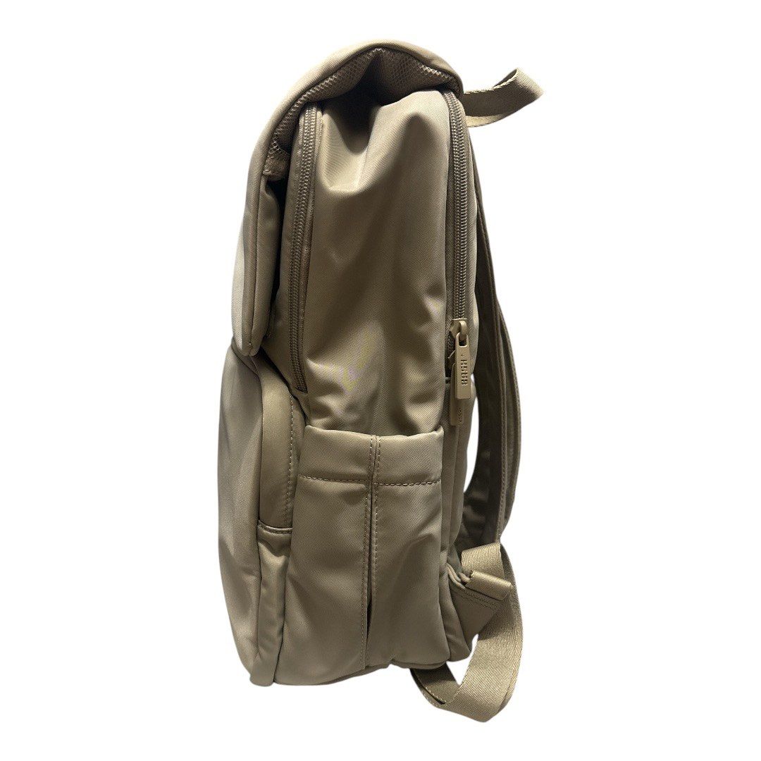 BASH Backpack (Dune) (Category: Backpacks) located in Bacolod City. Submitted by ggwayne (Listing ID 1447524422, Image 3). Description: Used only twice. RFS: not using it anymore. - Lightweight BASH backpack in a neutral 'Dune' taupe color. - Features a main compartment for storage. - Includes a convenient front zip pocket. - Adjustable padded straps ensure comfortable carrying. - Comes with the original BASH dust bag..