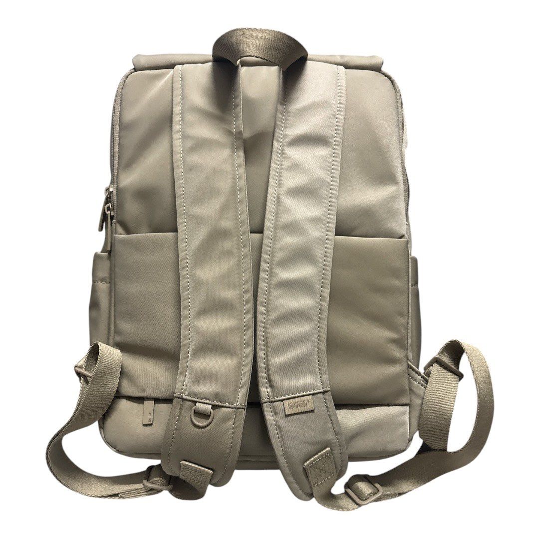 BASH Backpack (Dune) (Category: Backpacks) located in Bacolod City. Submitted by ggwayne (Listing ID 1447524422, Image 2). Description: Used only twice. RFS: not using it anymore. - Lightweight BASH backpack in a neutral 'Dune' taupe color. - Features a main compartment for storage. - Includes a convenient front zip pocket. - Adjustable padded straps ensure comfortable carrying. - Comes with the original BASH dust bag..