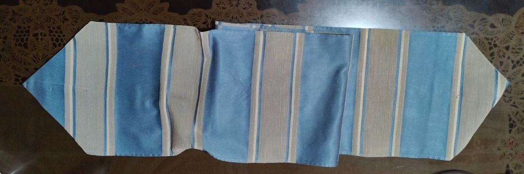 Blue and Taupe Table Runner (Category: Table Linen & Textiles) located in Quezon City. Submitted by oddduck02 (Listing ID 1447489334, Image 3). Description: - Blue and Taupe colored Table Runner - Has a slight dark iron mark stain as shown in the picture. - Bought in the US - Approximate Size - 172cm. - Reason for selling = Cleaning House .