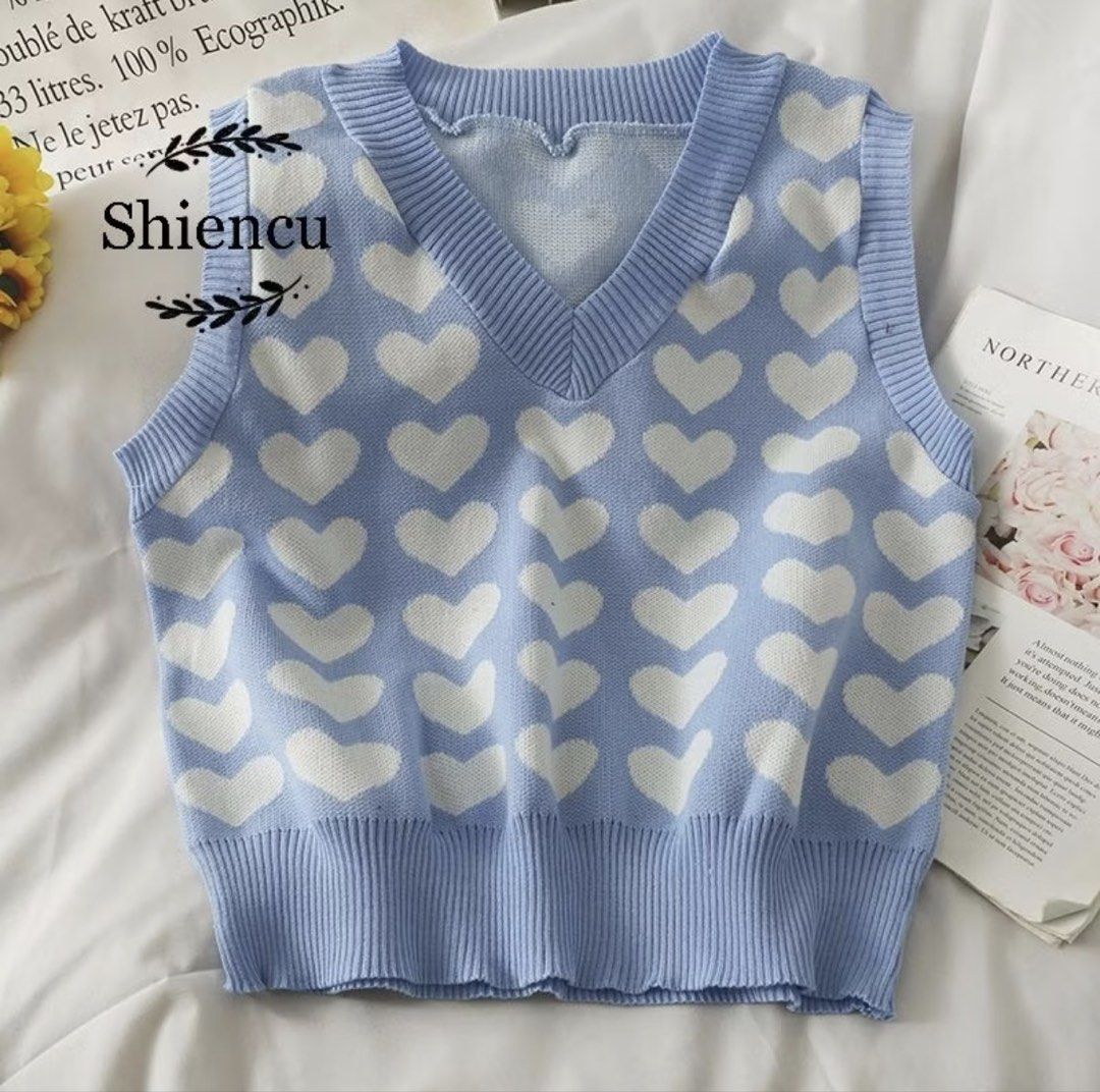 Blue Heart Knit V-Neck Vest (Category: Sleeveless) located in Quezon City. Submitted by morethanmakeup (Listing ID 1447623047, Image 2). Description: Knitted Vest V-Neck Sweater - Sky Baby Blue Heart Pattern - Brand new - Size: Free size - RFS: Impulse purchase .