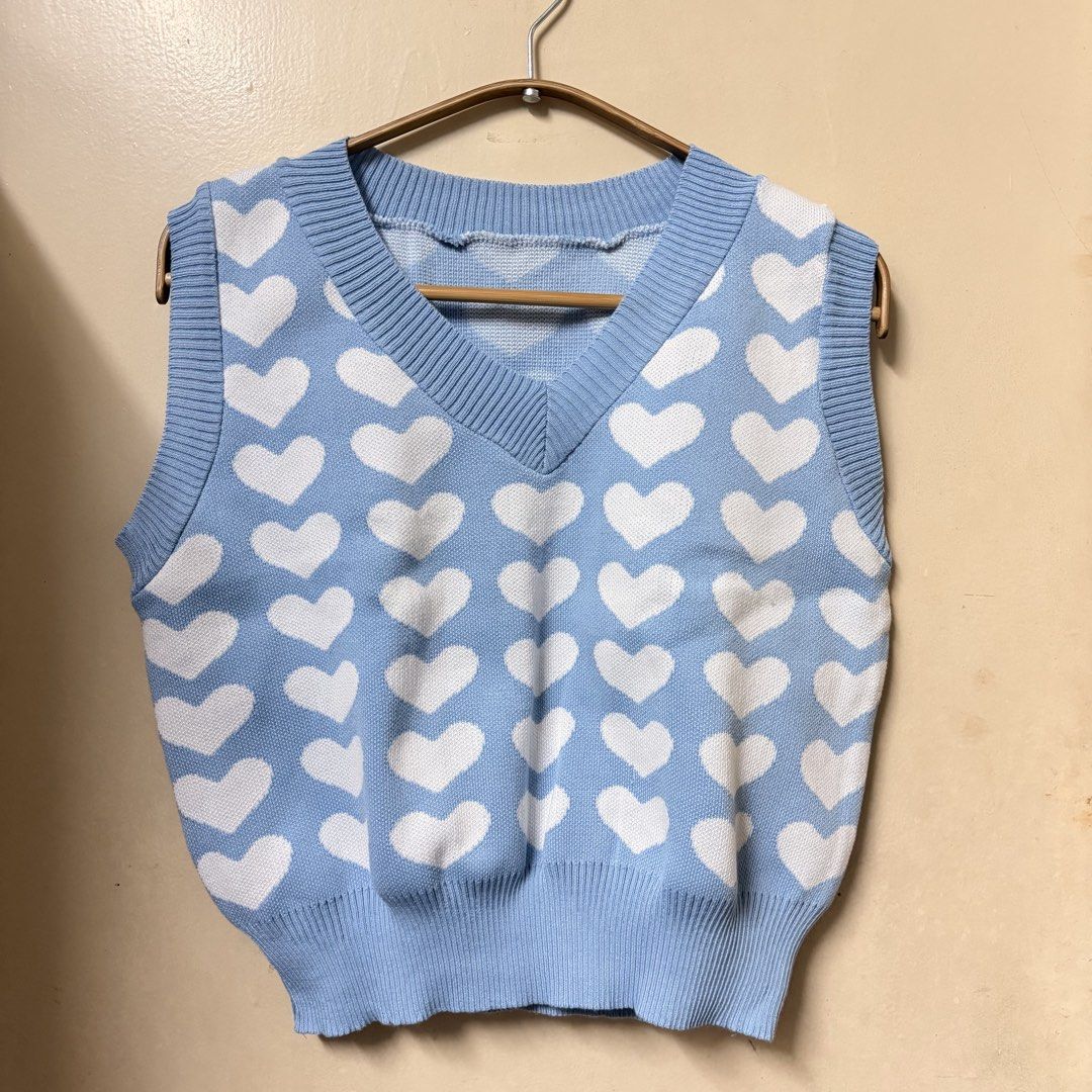 Blue Heart Knit V-Neck Vest (Category: Sleeveless) located in Quezon City. Submitted by morethanmakeup (Listing ID 1447623047, Image 3). Description: Knitted Vest V-Neck Sweater - Sky Baby Blue Heart Pattern - Brand new - Size: Free size - RFS: Impulse purchase .
